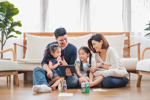 an Asian family with young children