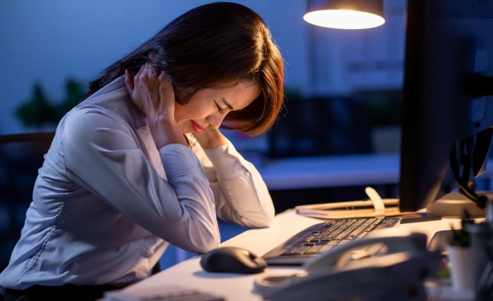 a woman stressed at work