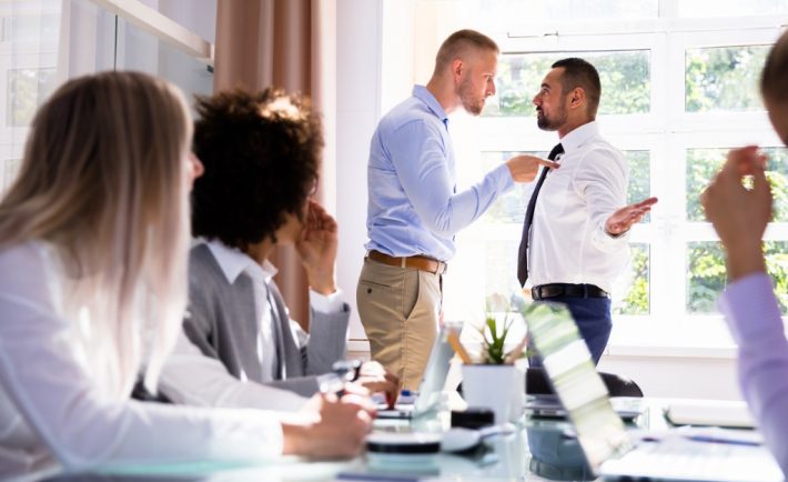 two-male-colleagues-fighting-in-office