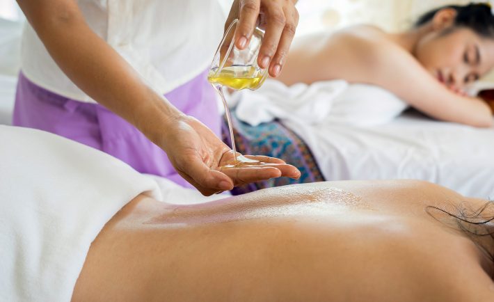 spa massage with essential oil