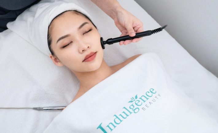 woman undergoing a facial treatment process