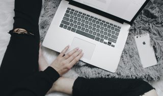 a person working on her MacBook Pro