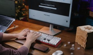 a person typing on a keyboard