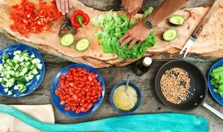 people slicing vegetables